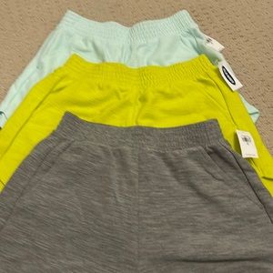 3 pairs of brand new shorts. Pockets. Never worn.